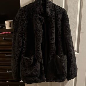 Fuzzy black jacket. Never worn